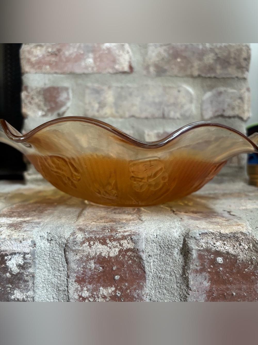 Jeannette Iris and Herringbone carnival glass bowl in the marigold color